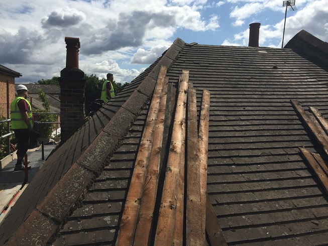 removing old roofing tiles 