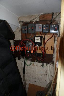 old electric meter and fuse box