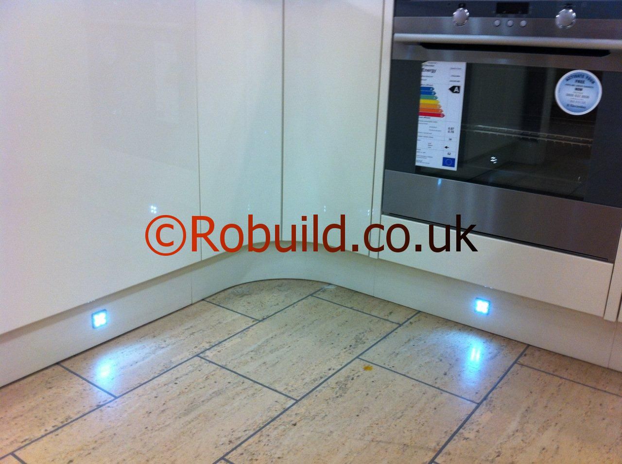 L shape kitchen plinth lights and floor